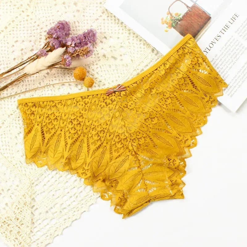 mustard yellow lace bikini panties laid flat