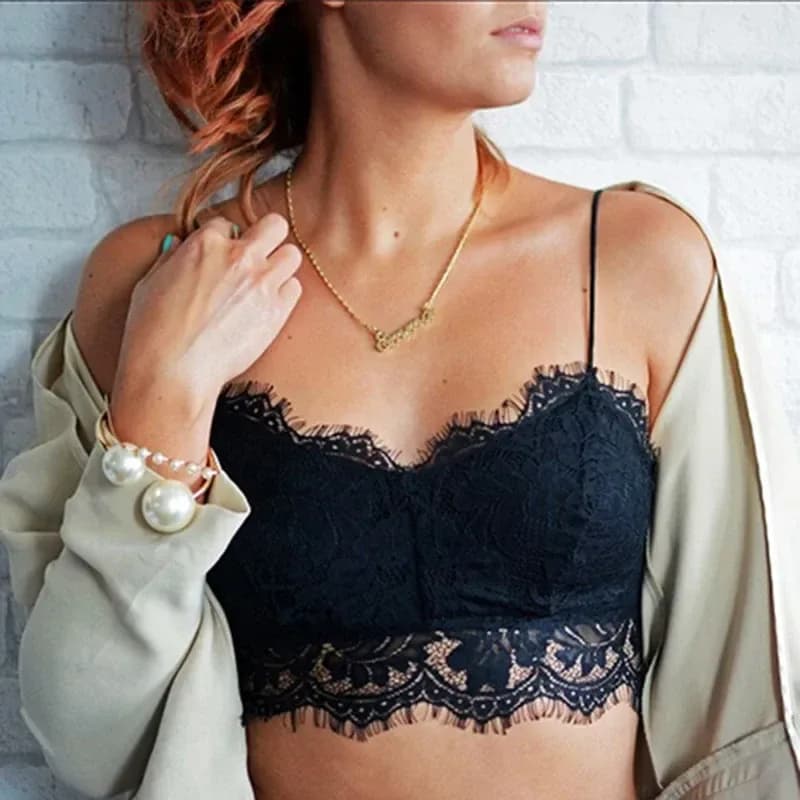 black eyelash lace longline bralette worn under an open jacket